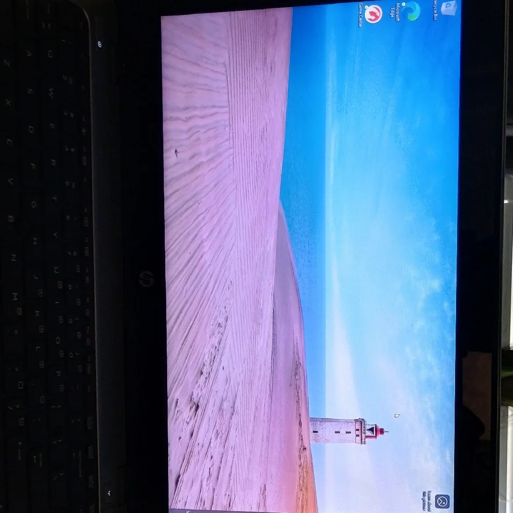 HP Laptop with Pink and Blue Display